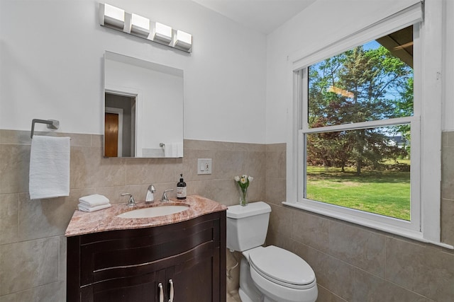 200 Fort Hill Rd, Scarsdale, NY 10583 - half bathroom featuring tile walls, vanity, and toilet