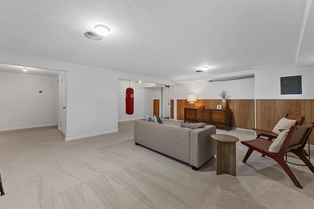 200 Fort Hill Rd, Scarsdale, NY 10583 - living area with light colored carpet, electric panel, and wood walls