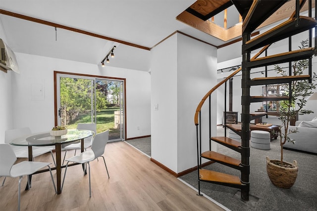 200 Fort Hill Rd, Scarsdale, NY 10583 - dining area featuring stairs, wood finished floors, baseboards, rail lighting, and a wall mounted AC