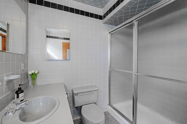 200 Fort Hill Rd, Scarsdale, NY 10583 - bathroom with tile walls, toilet, a shower stall, and vanity