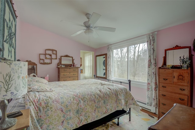 25 Evergreen Rd, Putnam Valley, NY 10579 - bedroom featuring baseboard heating, wood finished floors, and a ceiling fan