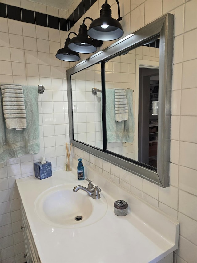 25 Evergreen Rd, Putnam Valley, NY 10579 - bathroom featuring tasteful backsplash, tile walls, and vanity