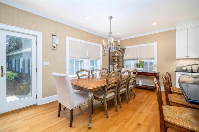 169 Hempstead Ave, Rockville Centre, NY 11570 - dining space with light wood-style flooring, a wealth of natural light, and a notable chandelier