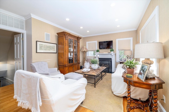 169 Hempstead Ave, Rockville Centre, NY 11570 - living area featuring a glass covered fireplace, wood finished floors, visible vents, and recessed lighting