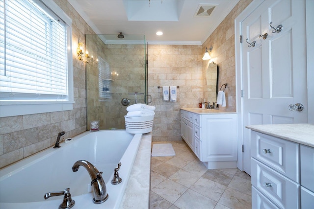 169 Hempstead Ave, Rockville Centre, NY 11570 - bathroom featuring a garden tub, crown molding, vanity, tile walls, and a tile shower
