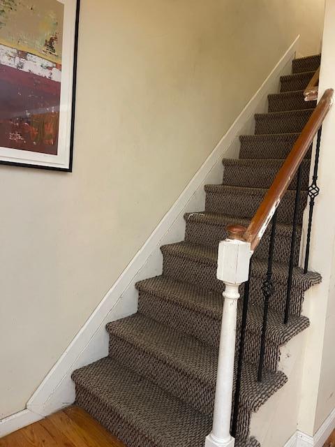 1255 E 223rd St, Bronx, NY 10466 - stairway with baseboards and wood finished floors
