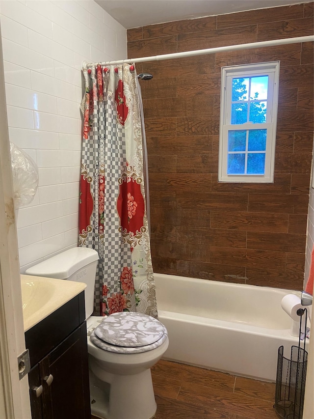 1255 E 223rd St, Bronx, NY 10466 - bathroom with vanity, toilet, shower / bath combo with shower curtain, and wood finished floors