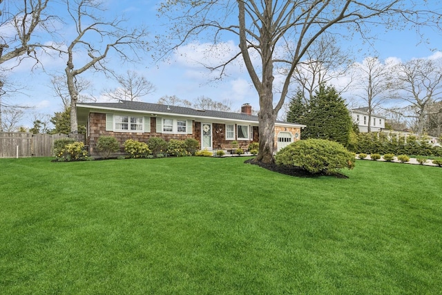 ranch-style house with a front lawn, a chimney, and fence