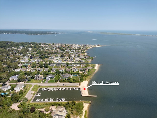 bird's eye view with a residential view and a water view