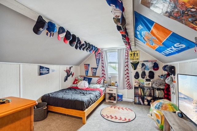 carpeted bedroom with vaulted ceiling