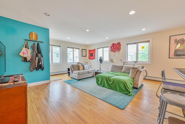351 Bch 87th St, Rockaway Beach, NY 11693 - living area with baseboard heating, healthy amount of natural light, hardwood / wood-style flooring, and recessed lighting