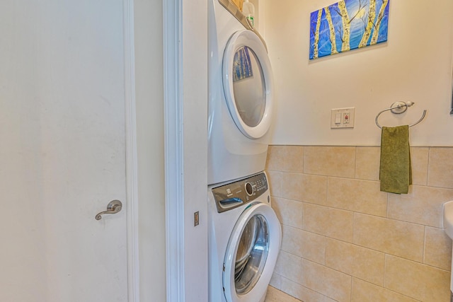 351 Bch 87th St, Rockaway Beach, NY 11693 - laundry area featuring stacked washer / dryer