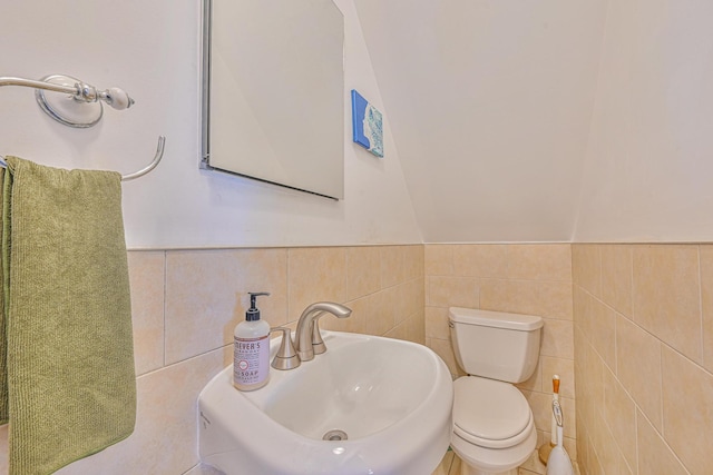 351 Bch 87th St, Rockaway Beach, NY 11693 - bathroom with tile walls and wainscoting
