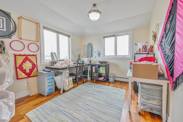 351 Bch 87th St, Rockaway Beach, NY 11693 - office space featuring plenty of natural light, a baseboard radiator, and wood finished floors