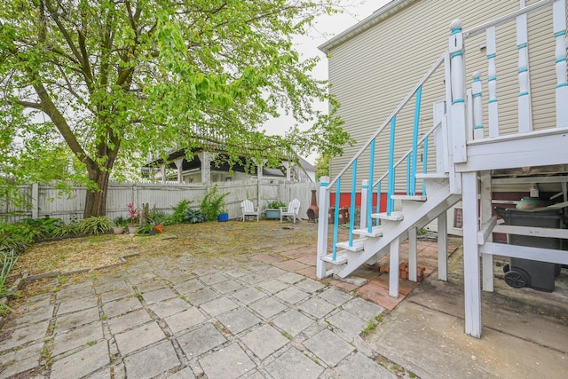 351 Bch 87th St, Rockaway Beach, NY 11693 - fenced backyard with a patio