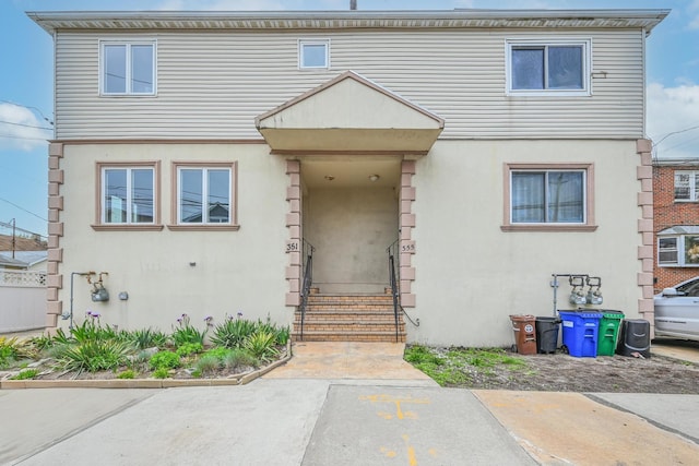 351 Bch 87th St, Rockaway Beach, NY 11693 - view of property featuring stucco siding