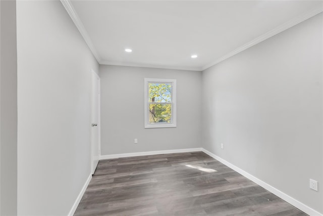 unfurnished room featuring crown molding, recessed lighting, dark wood-type flooring, and baseboards