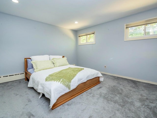 bedroom featuring baseboards, baseboard heating, recessed lighting, and carpet