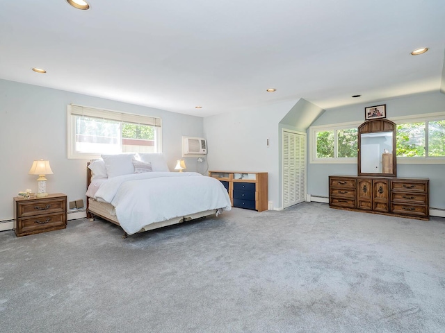 carpeted bedroom with a closet, baseboard heating, recessed lighting, and a wall mounted air conditioner