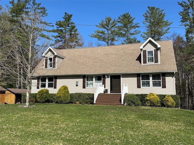 487 Southwoods Dr, Monticello, NY 12701 - new england style home with roof with shingles and a front lawn