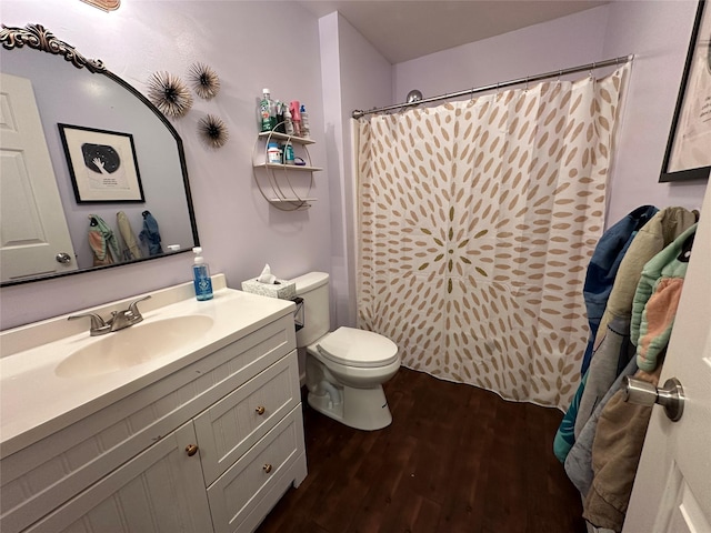 487 Southwoods Dr, Monticello, NY 12701 - full bath featuring toilet, a shower with shower curtain, vanity, and wood finished floors