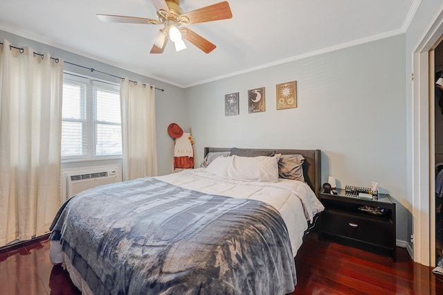 bedroom featuring hardwood / wood-style flooring, ceiling fan, and ornamental molding