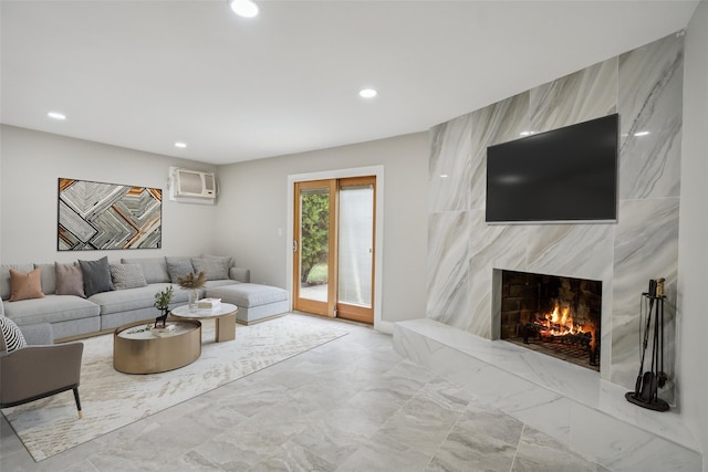 36 Pinewood Dr, Commack, NY 11725 - living room featuring recessed lighting, a fireplace, an AC wall unit, and marble finish floors