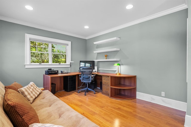 office space with crown molding, recessed lighting, baseboards, and light wood-style flooring