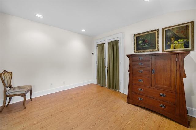 bedroom featuring recessed lighting, baseboards, access to outside, and light wood finished floors