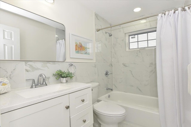 full bathroom featuring decorative backsplash, tile walls, shower / bath combo, toilet, and vanity