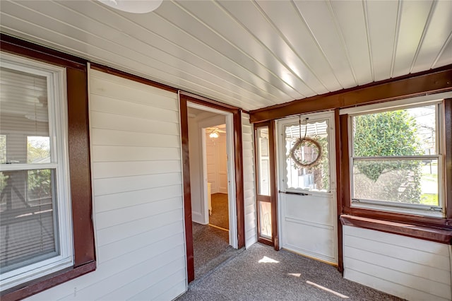 unfurnished sunroom featuring a healthy amount of sunlight