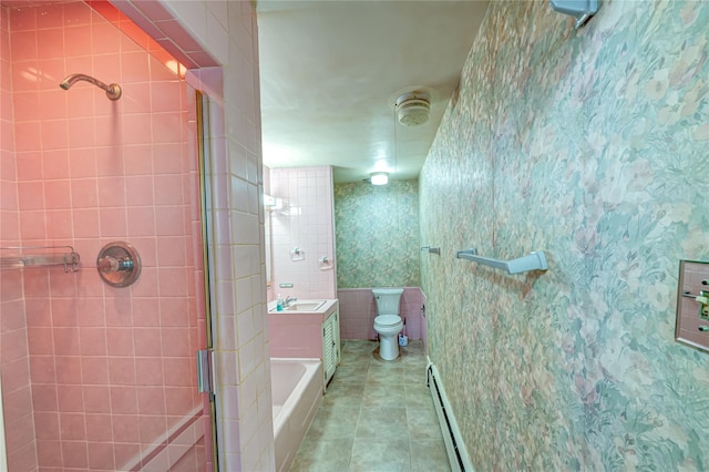 bathroom featuring a baseboard heating unit, toilet, a stall shower, tile patterned flooring, and vanity