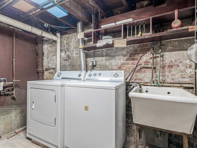 123-19 7th Ave, College Point, NY 11356 - laundry room featuring laundry area, washer and clothes dryer, and a sink