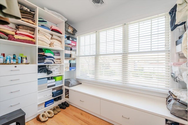 walk in closet featuring visible vents and light wood-type flooring