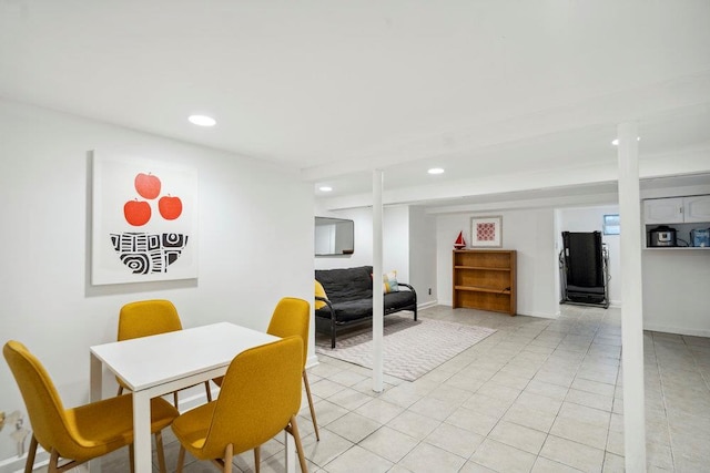 dining space with recessed lighting and light tile patterned floors