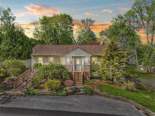 21 Rhinecliff Rd, Brewster, NY 10509 - view of front of property with stairs and roof with shingles