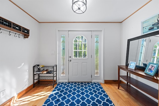 21 Rhinecliff Rd, Brewster, NY 10509 - foyer entrance with baseboards, ornamental molding, and light wood-style flooring