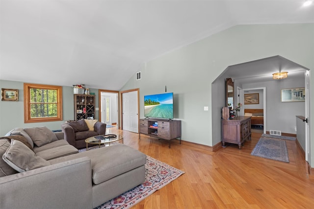 21 Rhinecliff Rd, Brewster, NY 10509 - living area with baseboards, visible vents, light wood finished floors, and lofted ceiling