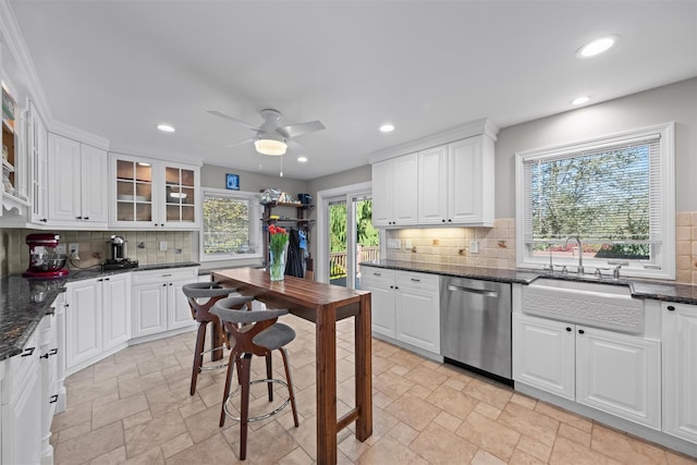 21 Rhinecliff Rd, Brewster, NY 10509 - kitchen with ceiling fan, a sink, dishwasher, tasteful backsplash, and stone tile flooring