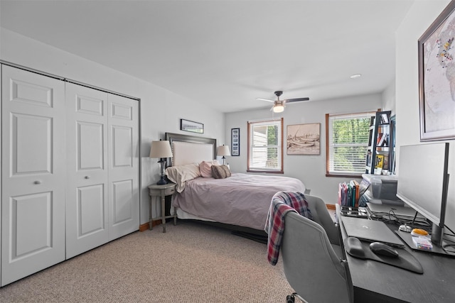 21 Rhinecliff Rd, Brewster, NY 10509 - bedroom featuring a closet, light carpet, and a ceiling fan