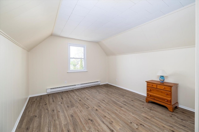 bonus room with baseboard heating, lofted ceiling, wood finished floors, and baseboards