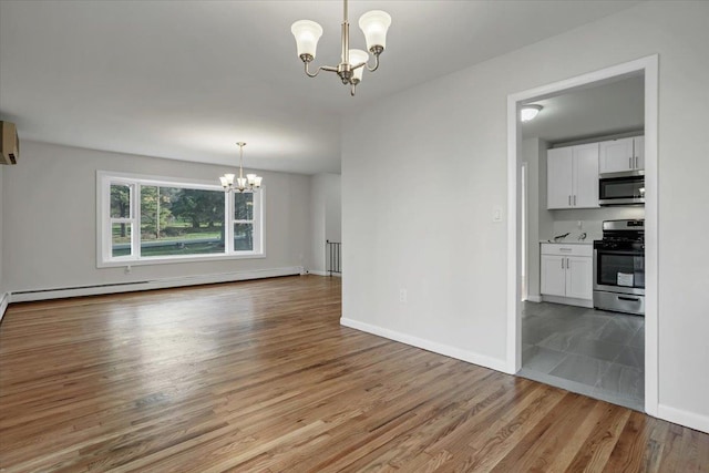 unfurnished dining area with a baseboard heating unit, baseboards, wood finished floors, a wall mounted air conditioner, and a notable chandelier