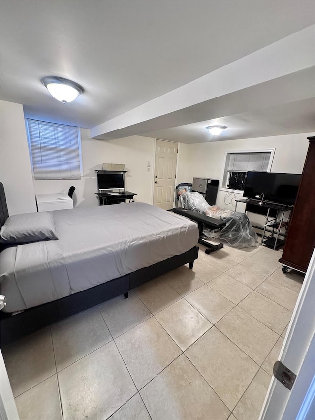 bedroom featuring tile patterned flooring