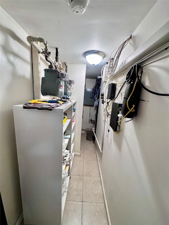 walk in closet featuring light tile patterned floors