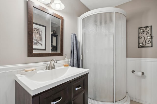 bathroom with wainscoting and vanity