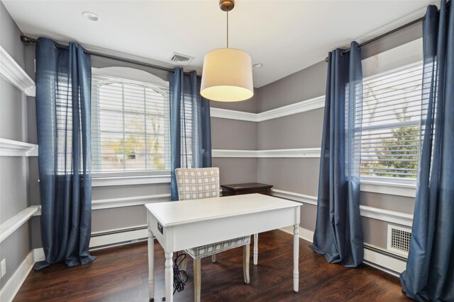 office area featuring visible vents, a baseboard heating unit, and dark wood-style flooring