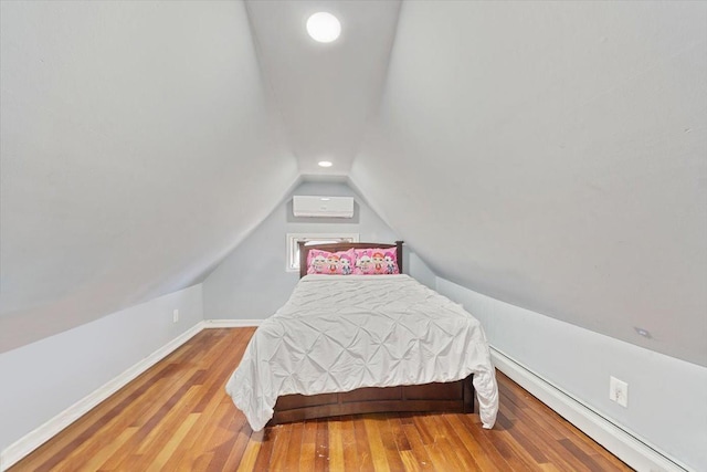 bedroom with lofted ceiling, baseboards, wood finished floors, and recessed lighting