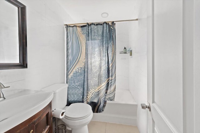 full bath featuring tile patterned flooring, toilet, vanity, and shower / bath combo with shower curtain
