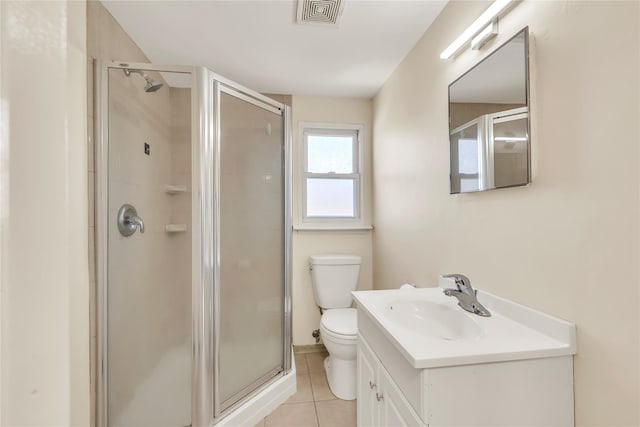 bathroom featuring visible vents, tile patterned floors, toilet, and a shower stall