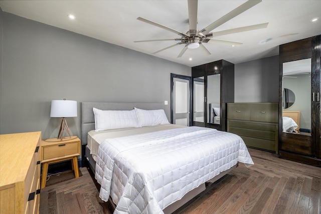 bedroom with recessed lighting, a ceiling fan, and wood finished floors